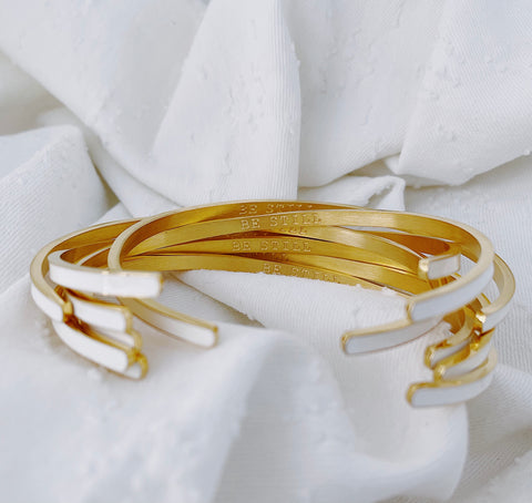 Be Still white and gold cuff